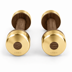 LIONIX CAELON luxury dumbbell pair in champagne gold finish with walnut wood handles