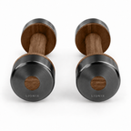 LIONIX CAELON luxury dumbbell pair in matte black finish with walnut wood handles