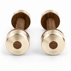 LIONIX CAELON luxury dumbbell pair in titanium gold finish with walnut wood handles